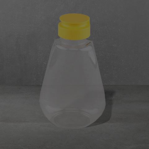 Ampolla de mel de plàstic