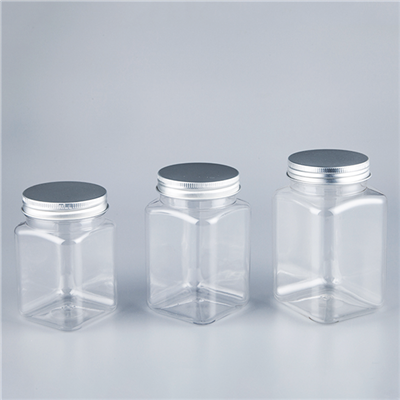 Flascons quadrats de plàstic transparents amb tapes metàl·liques